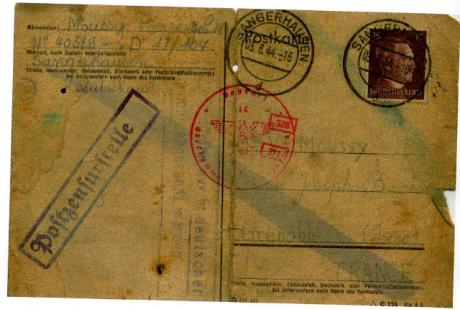 Lettre du résistant Pierre Moussy à sa famille lors de son enfermement dans un camp. Le papier est jauni et un peu déchiré. On voit l'adresse de destination et les tampons de l'armée allemande.